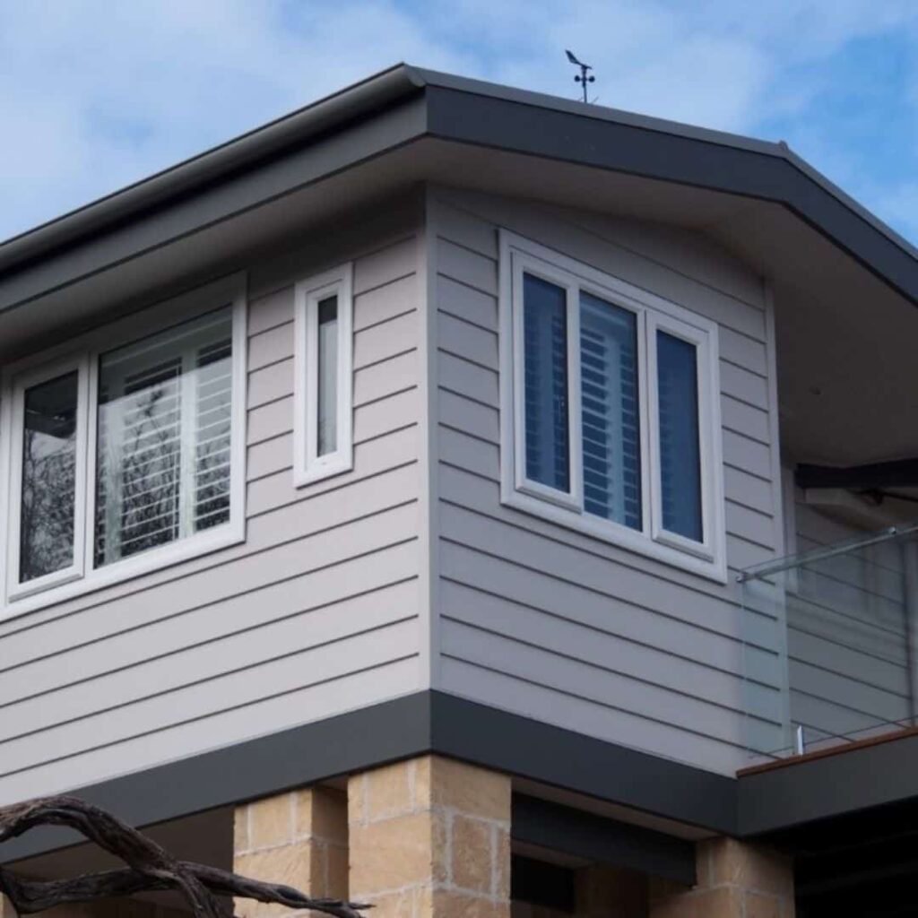 An Image of a Elegant black casement windows with crisp white trim.