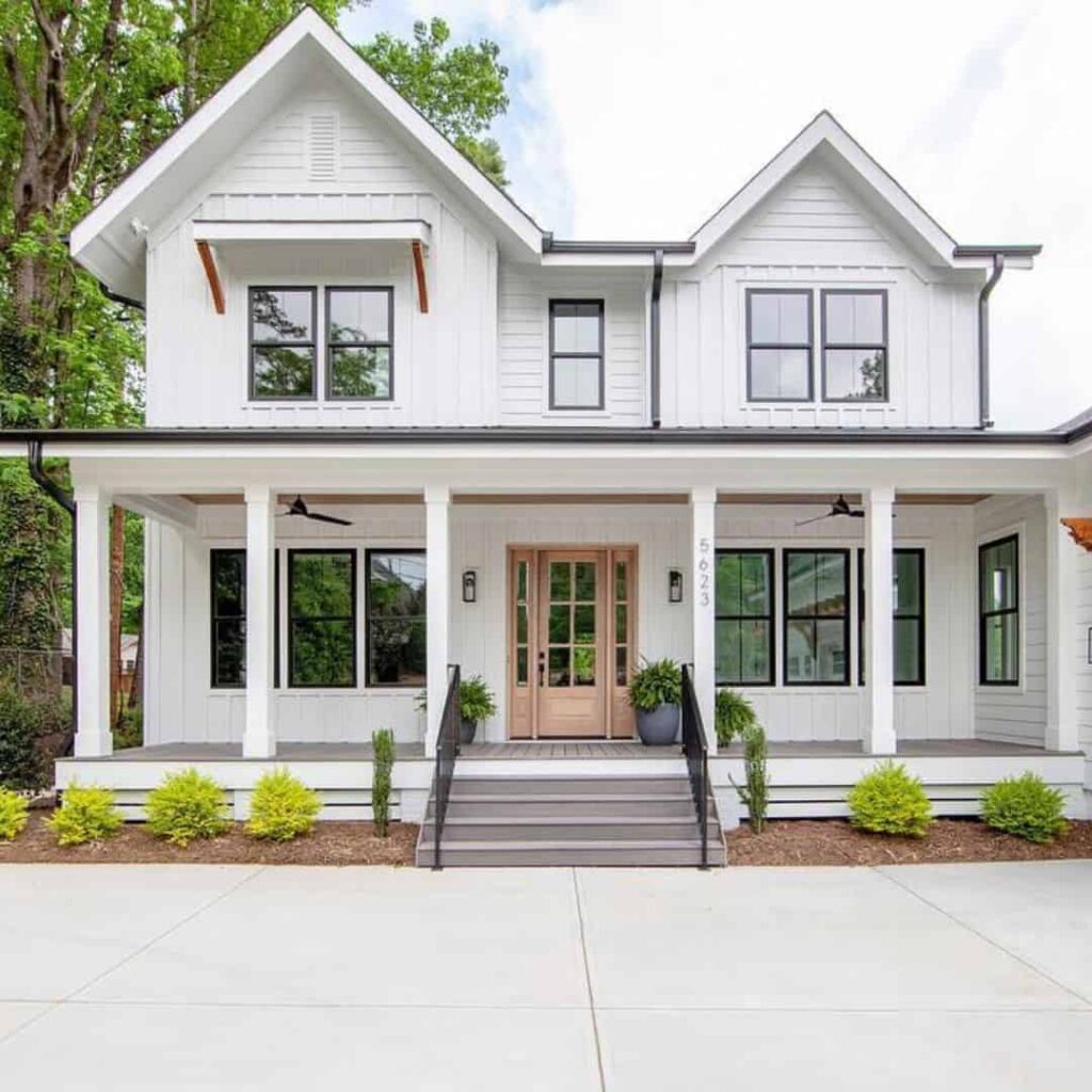 An image of a Farmhouse style Black Windows with Thick White Trims