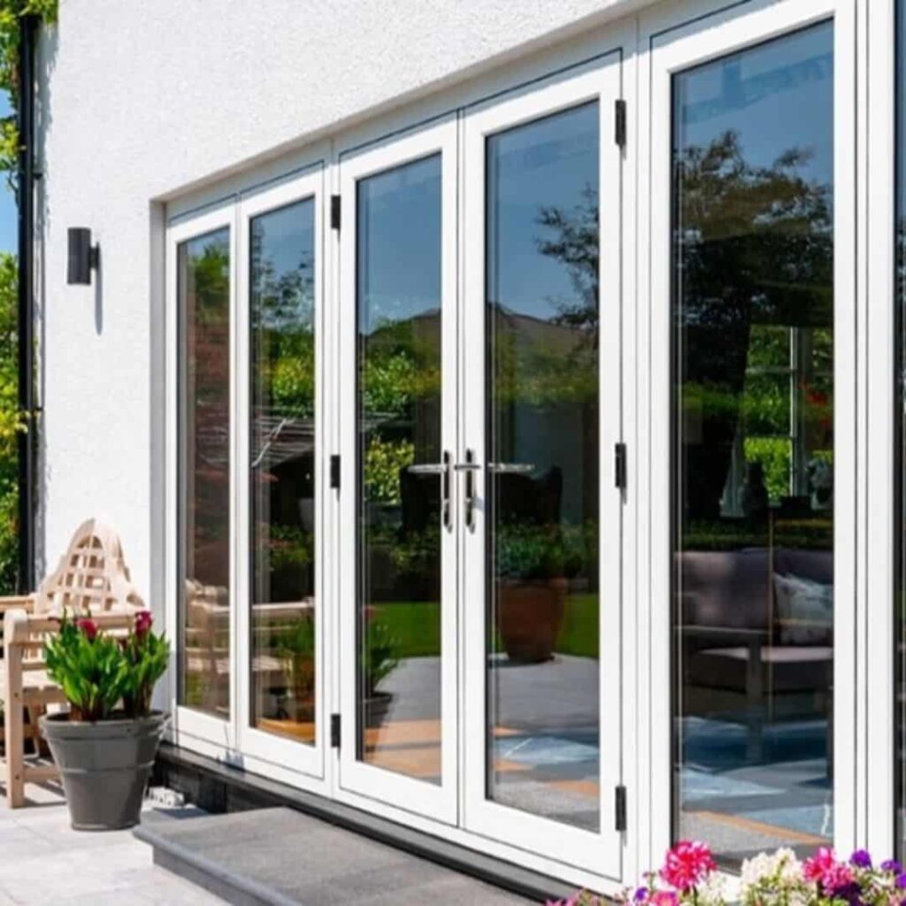 An image of a Floor-to-ceiling black windows with thin white trim